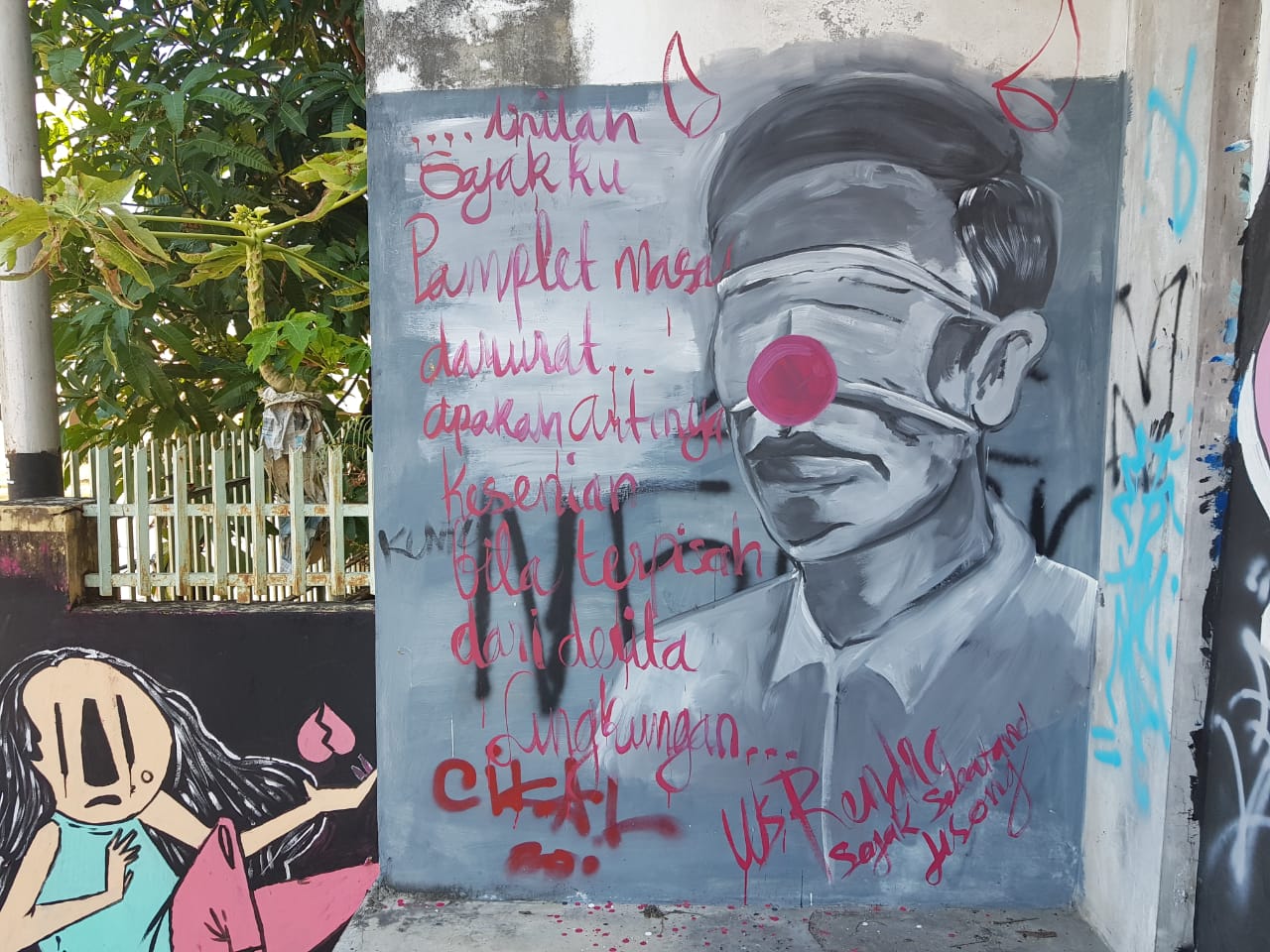 Mural mirip wajah Presiden Jokowi di jalan Yang Zubaidah, Kota Pangkalpinang.